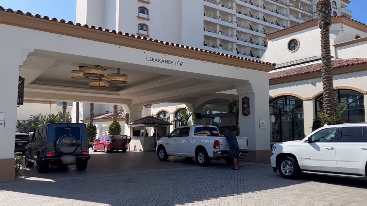 Valet parking and drop-off area of the Waterfront Beach Resort. 